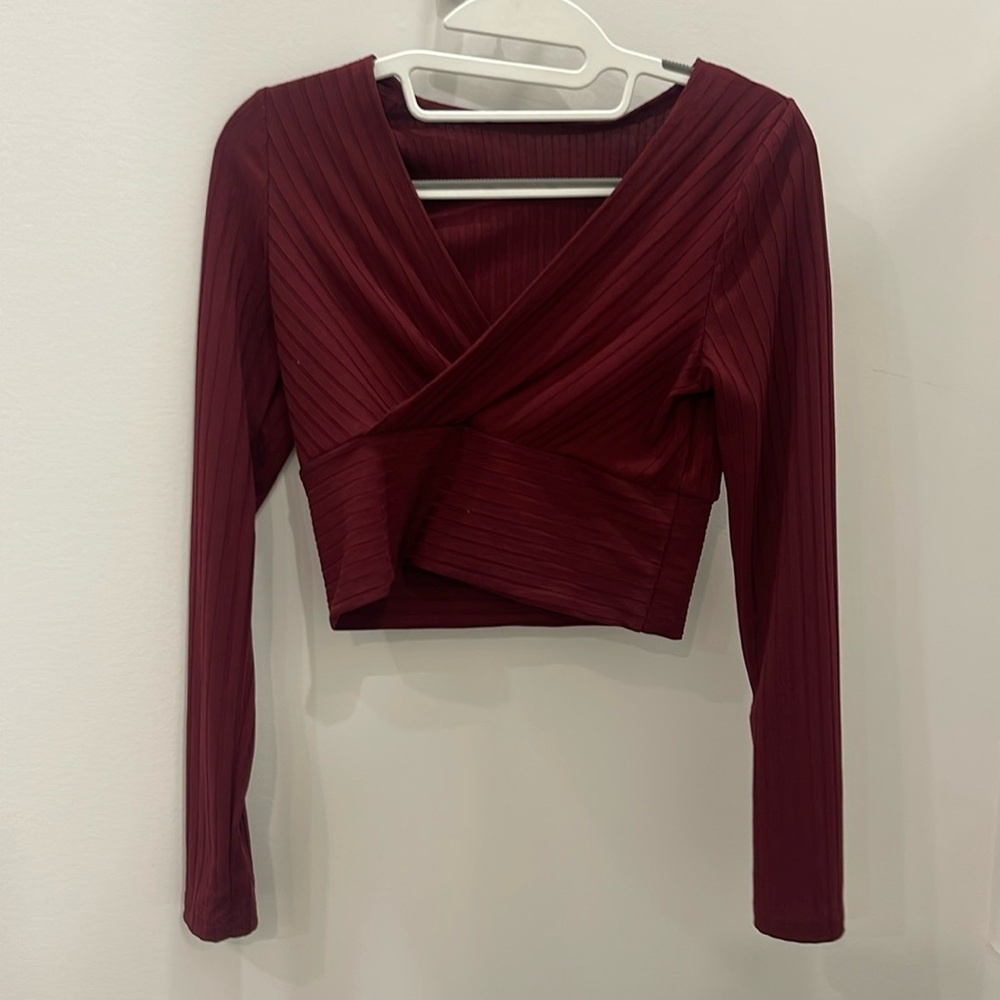 Red cross over long sleeve top